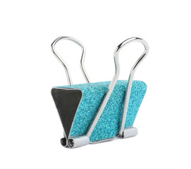 Turquoise binder clip isolated on white. Stationery item