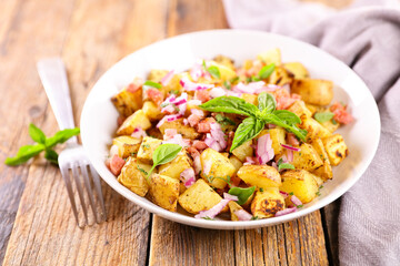 grilled potato with bacon and onion