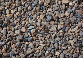 Crushed stone granite close-up. Railway embankment.