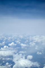 sky and clouds from the airplane window from above