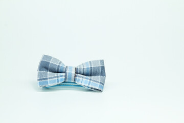 blue bow tie with white background. men's style fashion