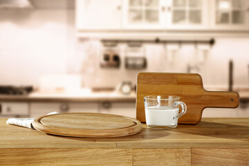 Fototapeta na wymiar Fresh milk on desk and kitchen interior 