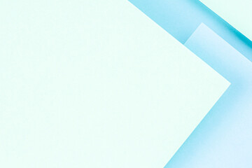 Abstract colored paper texture background. Minimal geometric shapes and lines in pastel green and light blue colours
