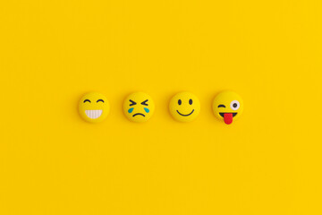 Emoticons on a yellow background