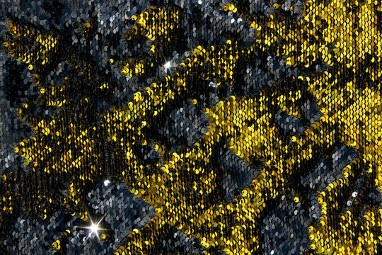 Fabric Background With Black And Gold Iridescent Sequins