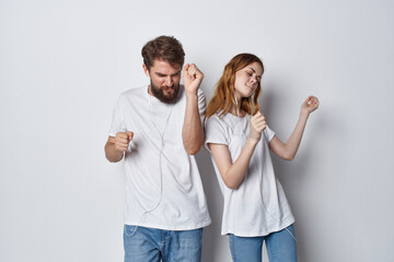 young couple in white t-shirts fun friendship fashion