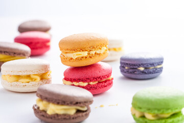many macaroons on white table