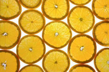 round orange slices on white background