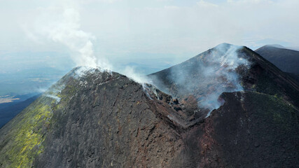 Crater Etna top view from above with smoke -Sicily