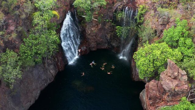 Tourists On The Plunge Pool Of Florence Falls In Litchfield National Park In Australia. aerial