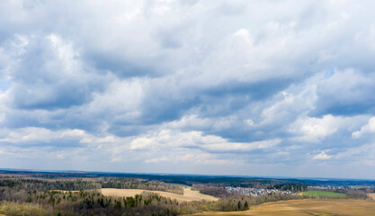 Aerial view of agricultural landscape with fields in spring season.