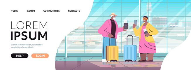 senior couple of tourists using smartphones grandparents with luggage passports and tickets ready to boarding at airport