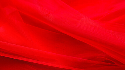 Red luxury tulle fabric texture for background. elegance wallpaper