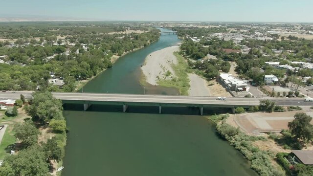 Aerial: Traffic crossing the Sacramento River, Red Bluff, California
