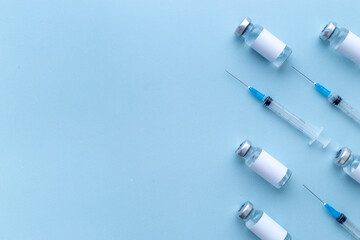 Medicine bottle for injection. Coronavirus vaccine ampoules with syringe