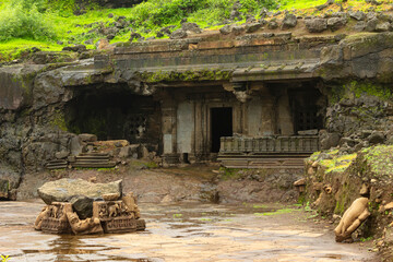 Jain Cave Temple with a beautifully carved entrance at foothills of Tringalwadi fort, Nashik,...