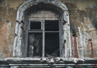Fototapeta na wymiar old and scary window of abandoned house