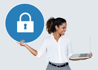 Woman holding a padlock and a laptop