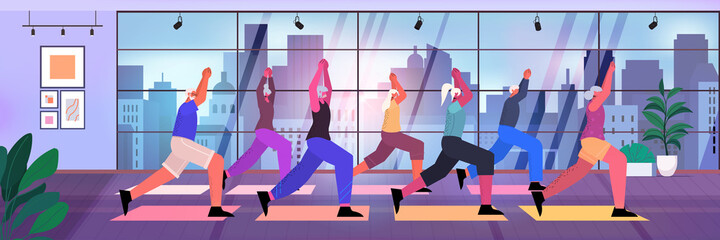 senior people group doing squats on step platform aged men women training in gym aerobic workout healthy lifestyle