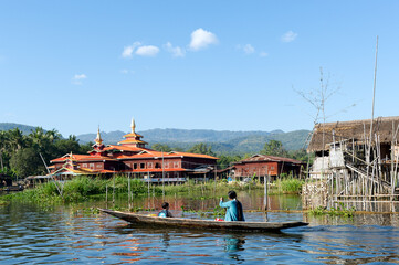Fototapeta na wymiar Myanmar. Inle lake. Shan state. Transportation by boat in floating village Shan