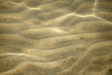 sea ​​sand on the beach with sunlight