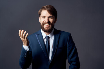 The man in a suit executive office dark background