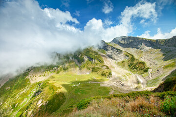 Obraz premium Beautiful mountain landscape. Grassy mountains and hills.