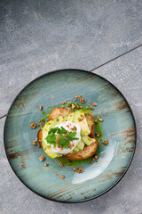 sandwich with poached egg and avocado top view, flat lay
