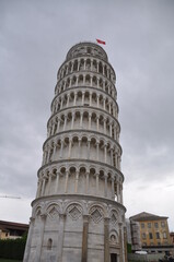 Fototapeta na wymiar Low angle view of Leaning Tower of Pisa, Italy