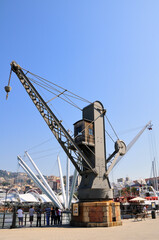 Fototapeta na wymiar Genoa Old Port. Ancient Port Crane. Porto Antico. Liguria, Italy.