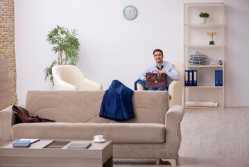 Young businessman employee waiting for business meeting