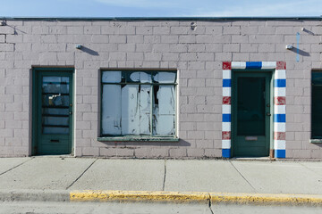 Entrance of abandoned barber shop