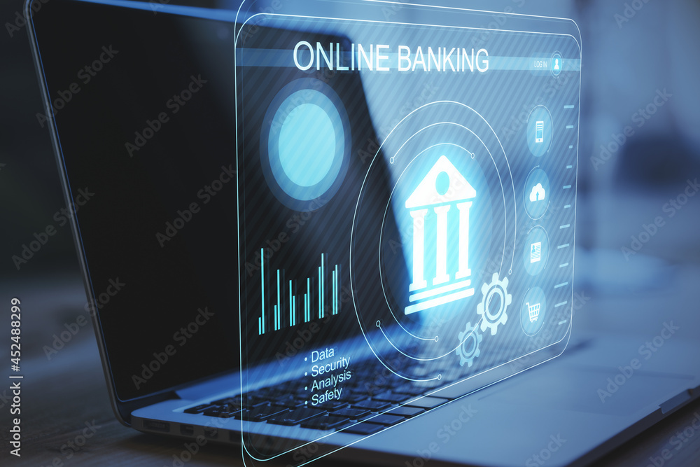 Poster close up of laptop at desktop with abstract glowing interface on blurry background. online banking, 