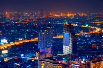 Naklejka premium Bangkok cityscape. Bangkok night view in the business district, soft and select focus