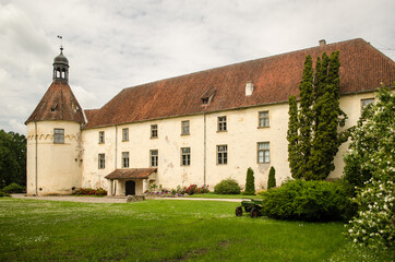 Fototapeta na wymiar Medieval castle with a large tower in Jaunpils, Latvia.
