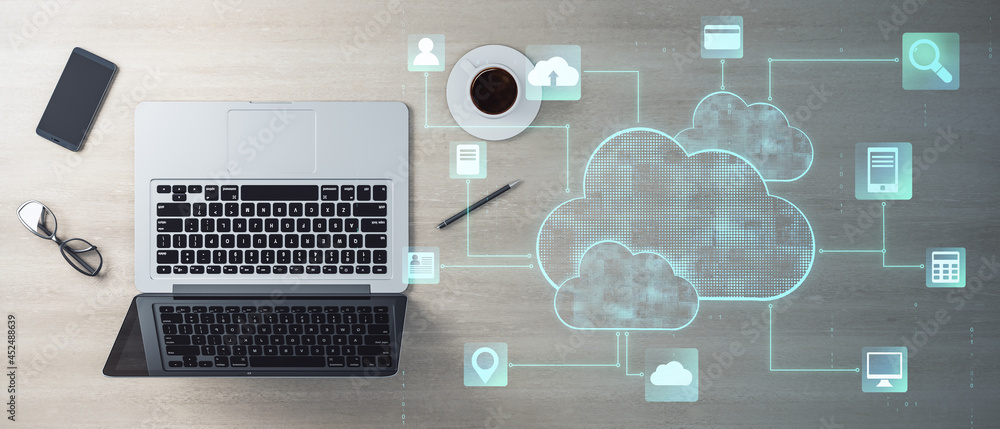 Poster top view of office desktop with glowing cloud computing interface, laptop, smartphone, coffee, cup a
