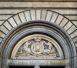 London, United Kingdom - Apr 19, 2019 : Exterior signage of The National portrait gallery. Sign above the main entrance, Houses art and collection of portraits of famous British people.