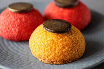 Shu cakes on a gray plate.