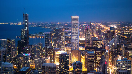 Fototapeta na wymiar Chicago by night - amazing aerial view over the skyscrapers - CHICAGO, ILLINOIS - JUNE 12, 2019