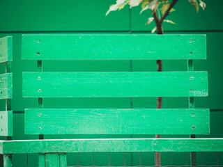 green background of wooden slats
