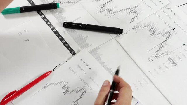 Work table with stock tables and stationery.
