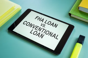 Fotobehang FHA loan vs Conventional loan choice for mortgage on the screen. © Vitalii Vodolazskyi