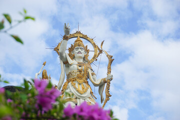 Denpasar, Bali, Indonesia (1 August 2021): Landmark of Denpasar city. City Park "Titi Banda Statue". Ramayana folklore.