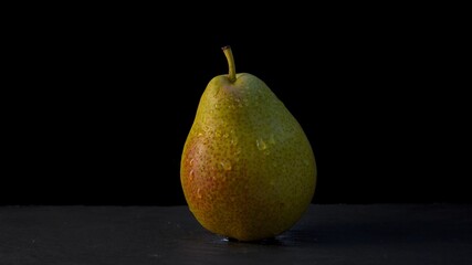 pear on black background