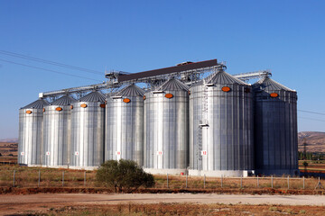 grain silos in a farm © YAHOES