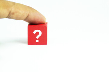 a red cube with a question mark or question icon. Question mark concept