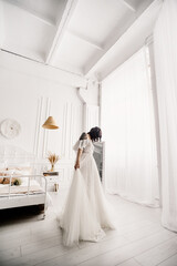 Fototapeta premium The bride in a white wedding dress