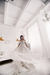 Fototapeta premium The bride in a white wedding dress
