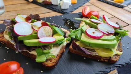 Breakfast toast with avocadoes 