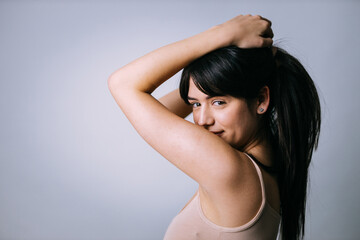 Fototapeta premium Beautiful girl posing in studio for a 